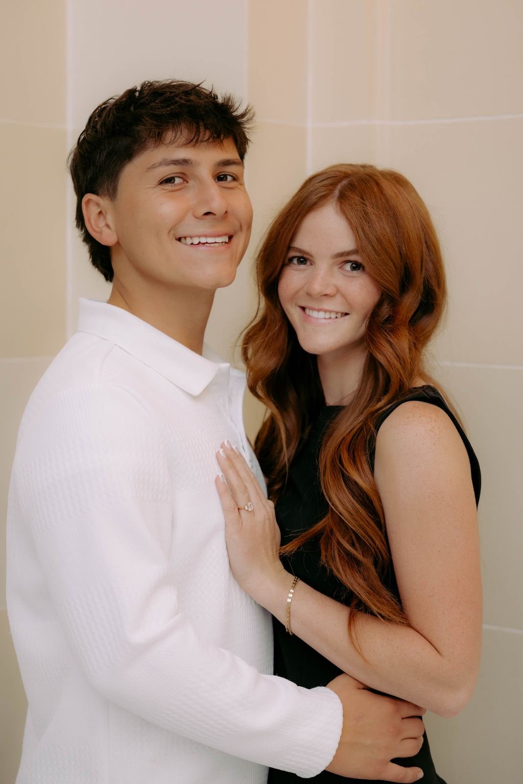 Emilio and his wife smiling together