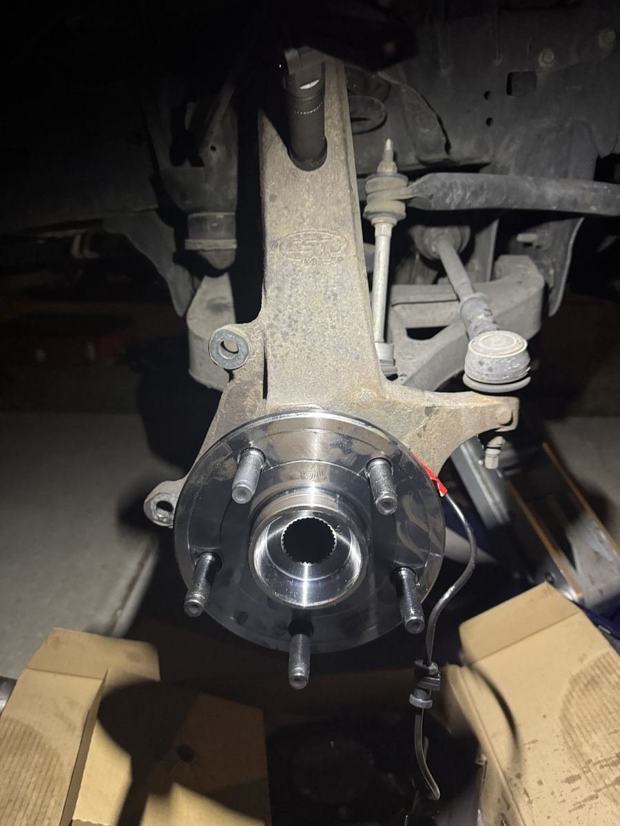 New wheel hub bearing installed on a steering knuckle